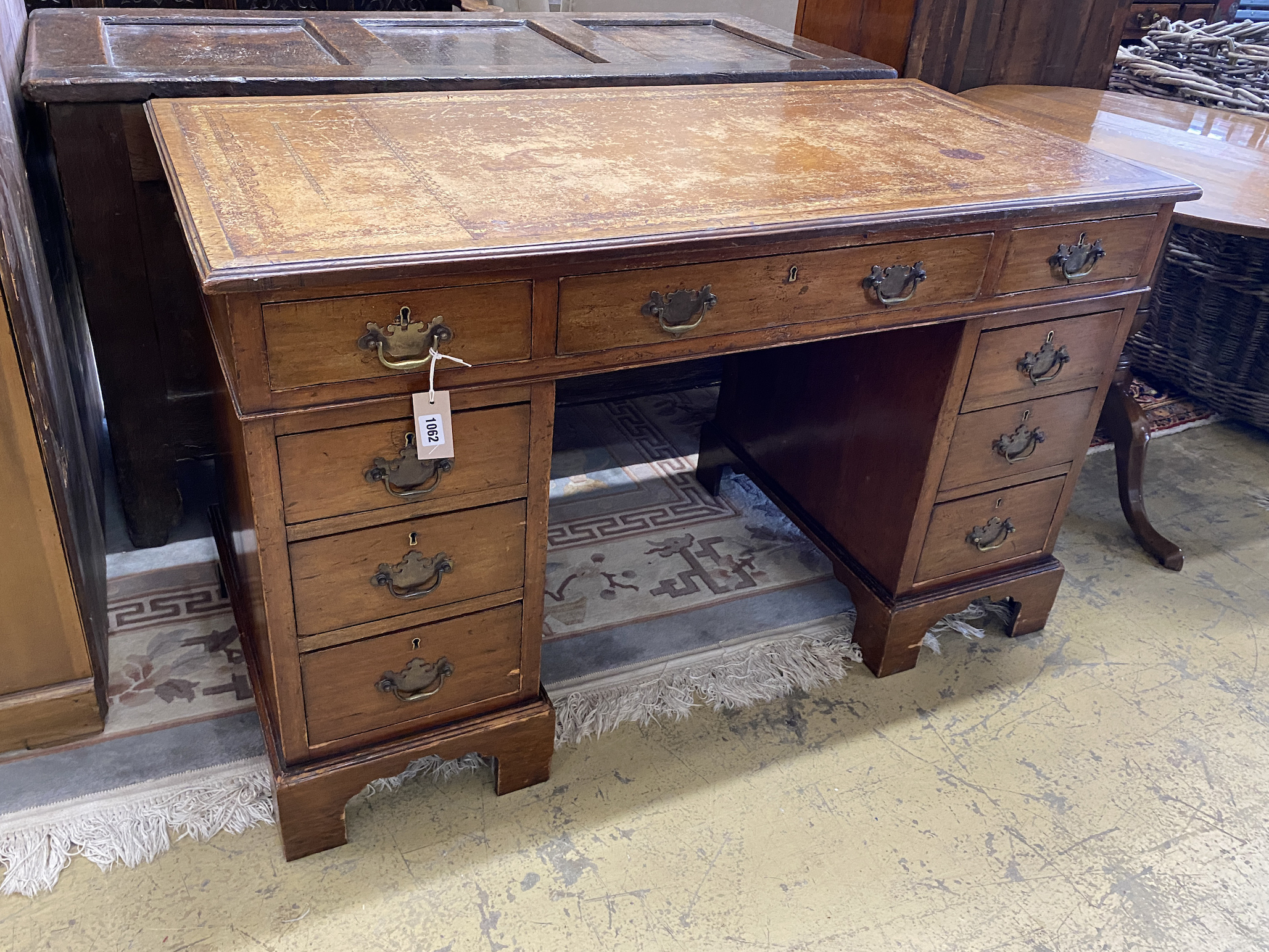 An early 20th century mahogany pedestal desk, length 122cm, depth 60cm, height 75cm